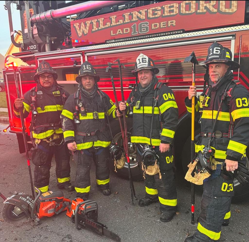 Firefighters Child, Centrone, Lt O'Donnell and firefighter Robertson after an all-hands fire in Burlington Twp.
