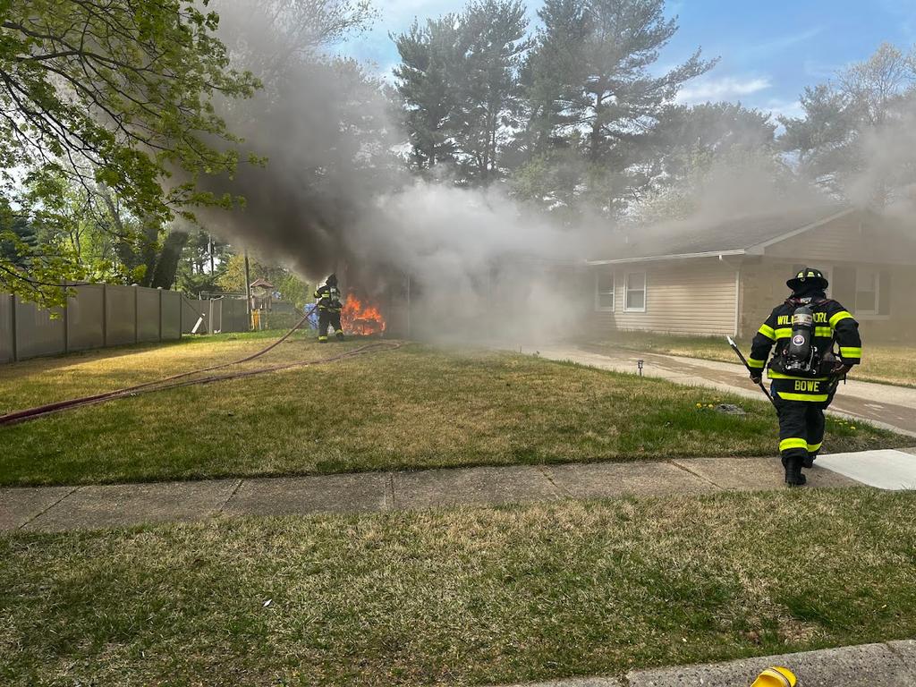Firefighter Bowe preparing to make entry at a dwelling fire.