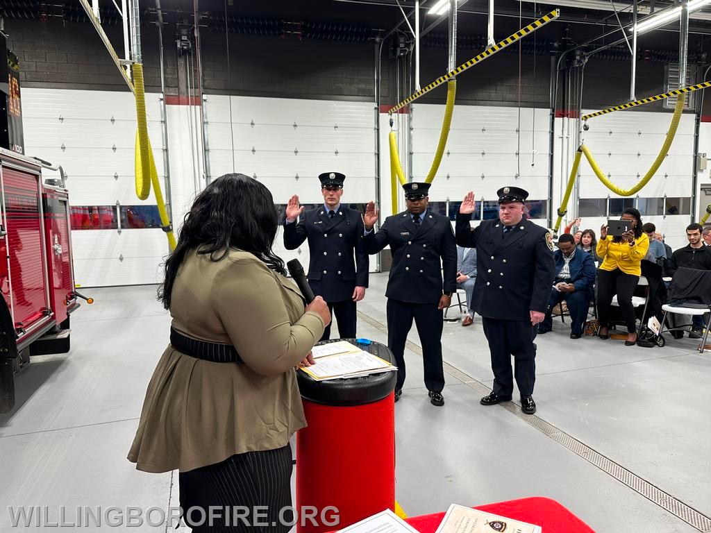 Firefighters get sworn-in by Mayor McIntosh. (L to R) Jonathan Levins, Eduardo Sierra, and Michael Nardi.